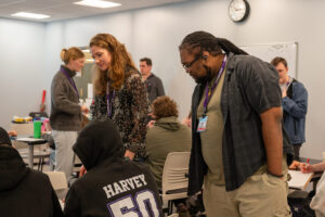 Landmark College student helps lead workshop at local high school.