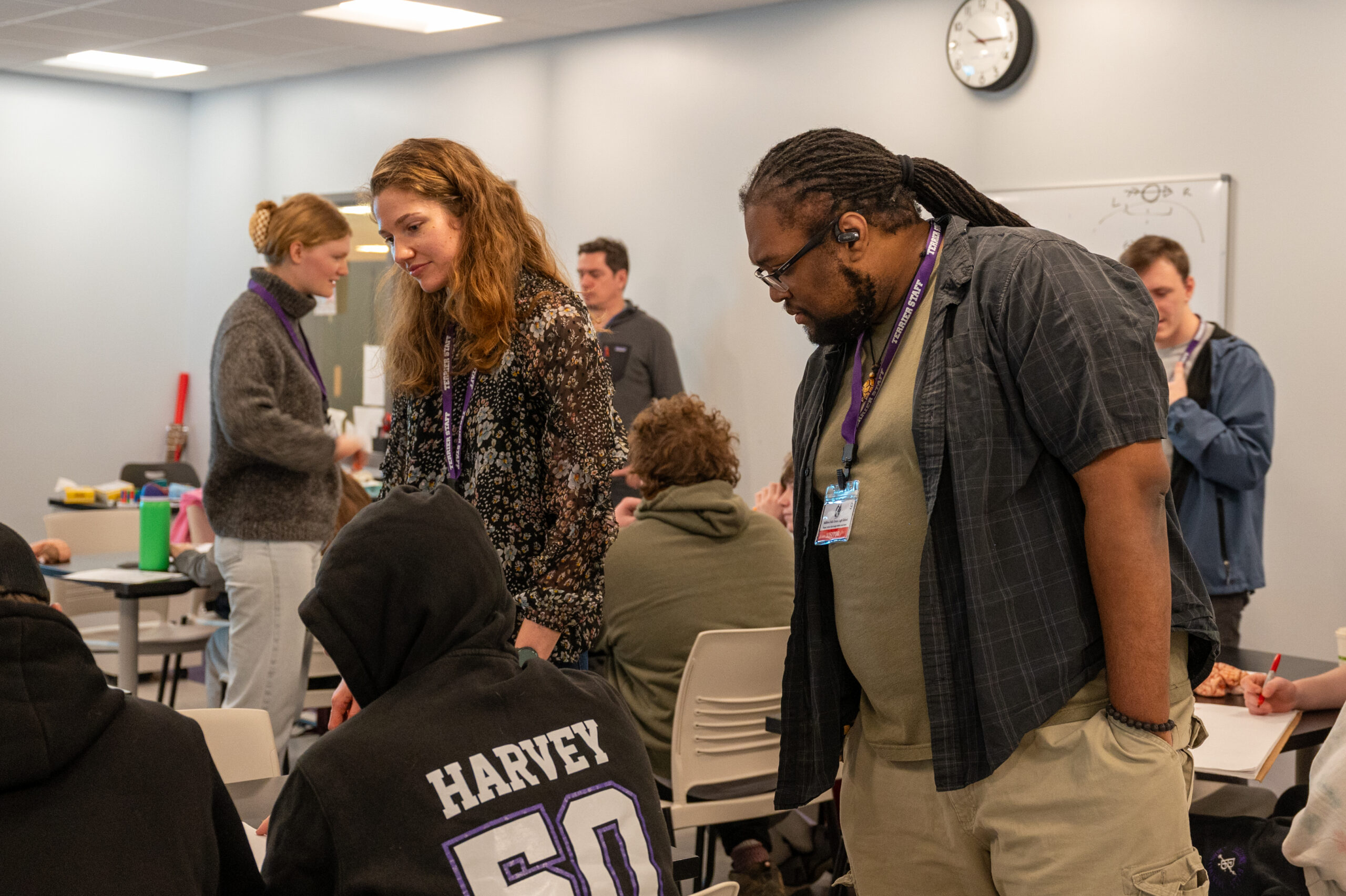 Landmark College student helps lead workshop at local high school.
