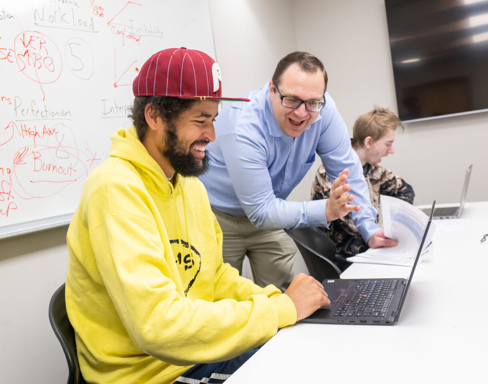 Adam Lalor coaching a research mentor.